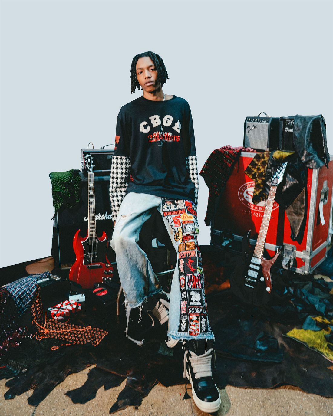 Reworked club jersey with patched denim.
